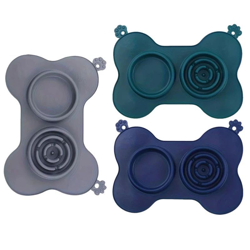 Furfamilyclub Cat Slow Eating Mat in three colors shaped like a bone with feeding and slow eating sections