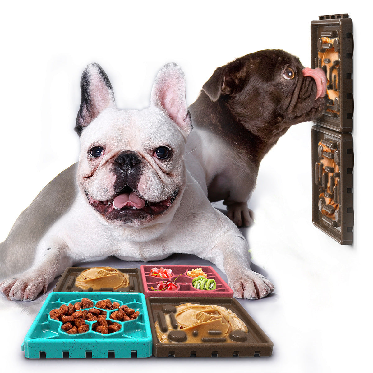 Two dogs using a Dog Licking Mat Slow Feeder with compartments for treats and peanut butter