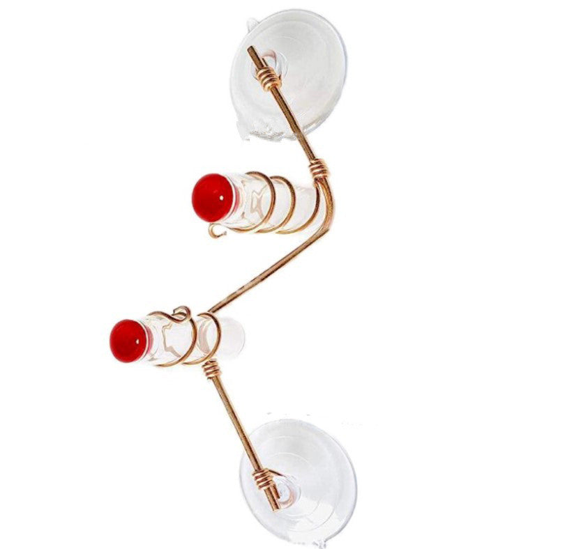 Garden Bird Feeder with two red feeding ports and suction cups for window attachment