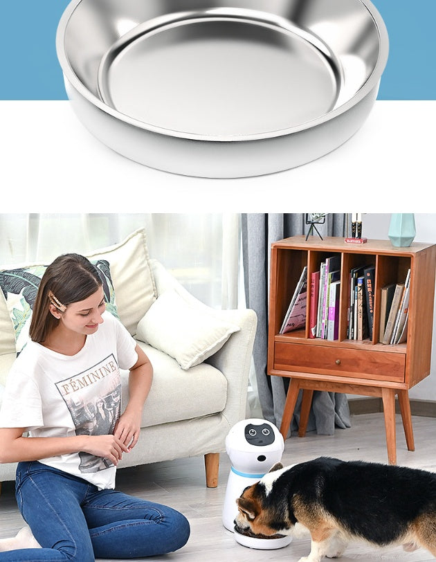 Smart Pet Food Dispenser with stainless steel bowl used by a woman to feed her dog at home
