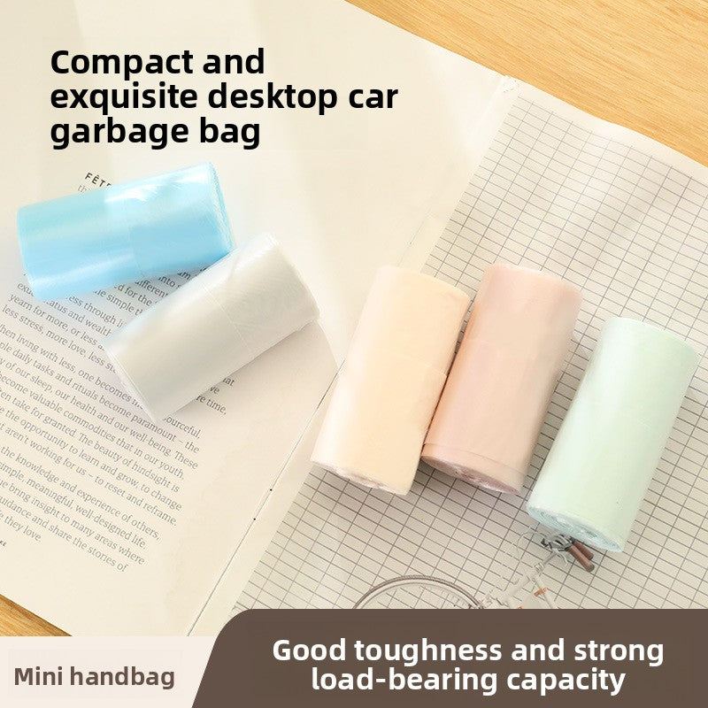 Set of compact garbage bags on a desk with text highlighting their features.
