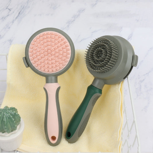 Two pet grooming brushes on a yellow towel with a marble background