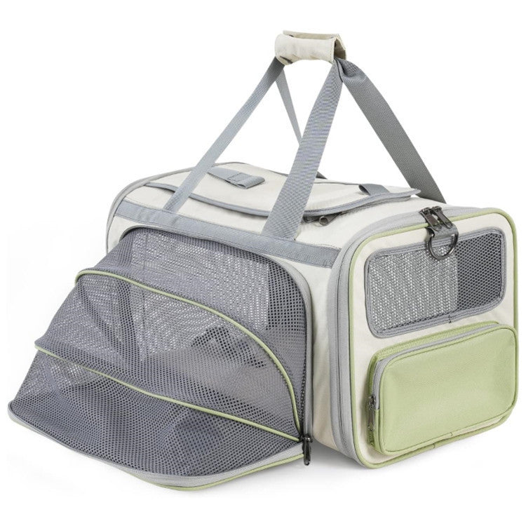 Pet carrier with mesh sides and a handle on a white background