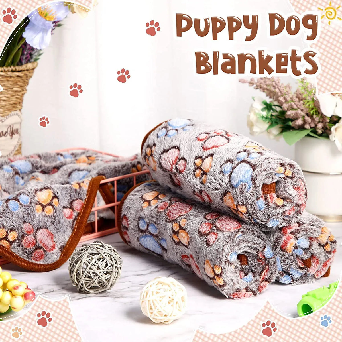Rolls of 'Puppy Dog Blankets' with paw print pattern on a decorative background.