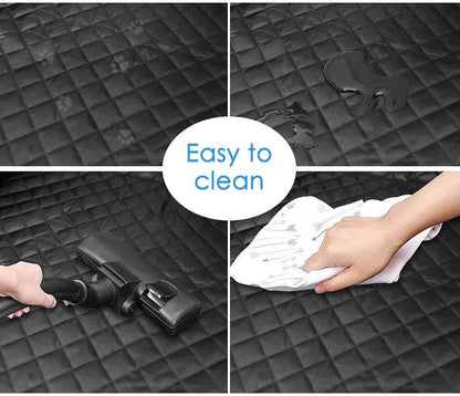 Durable travel mat for dogs showing easy to clean black quilted surface with water spills and vacuuming