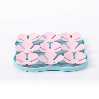 Furfamilyclub Eating Pet Calming Mat with blue base and pink slow feeder petals for pet comfort