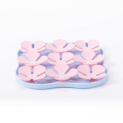 Furfamilyclub Eating Pet Calming Mat with pink paw-shaped sections on blue base for pet comfort